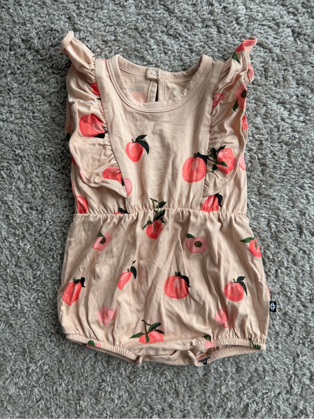 Kyte BABY Peach Print & Tan Ruffle Romper